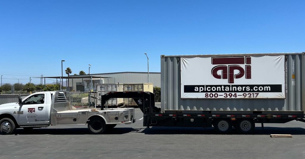 API Trailers truck delivering a portable storage container in Santa Maria
